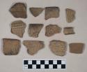 Ceramic, earthenware, body and rim sherds with punctate, incised, and impressed decoration