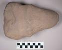 Ground stone, triangular grooved axe with flat end