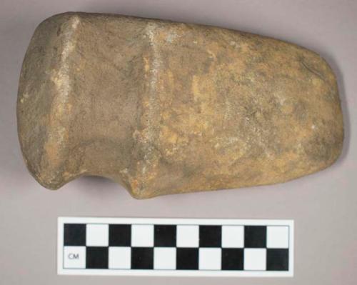 Ground stone, grooved axe with rounded end and base