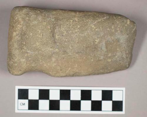 Ground stone, grooved axe with flat end and base