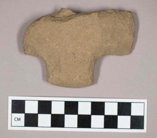 Ground stone, notched fragment