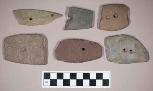 Ground stone, perforated gorget fragments