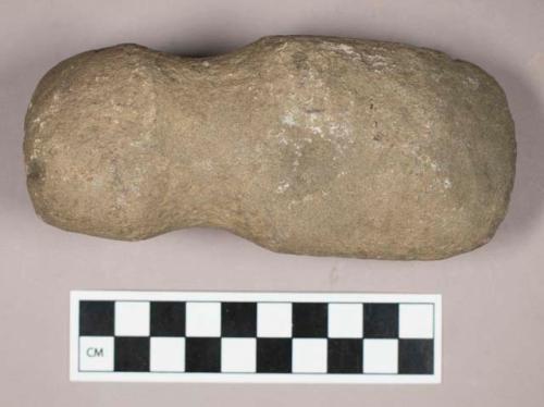 Ground stone, grooved axe with rounded end