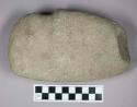 Ground stone, grooved axe with flat base and rounded end