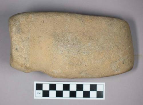 Ground stone, grooved axe with flat base and end