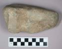 Ground stone, grooved axe with flat base and rounded end