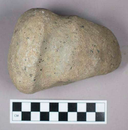 Ground stone, grooved axe with flat base and rounded end