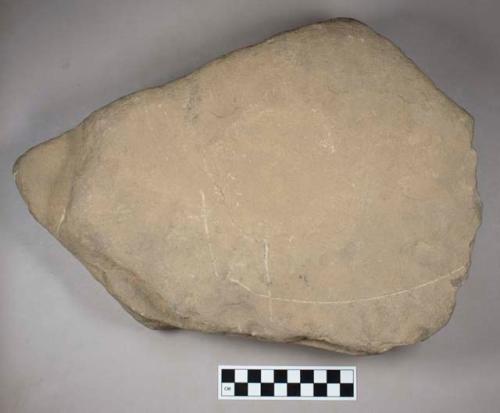 Ground stone, grinding stone, pitted on both sides