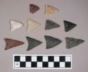 Chipped stone, straight and concave base, triangular bifaces