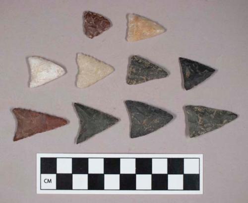 Chipped stone, straight and concave base, triangular bifaces