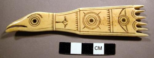 Comb, carved ivory bird form