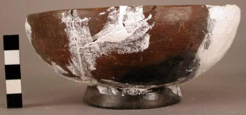 Restored brown pottery bowl