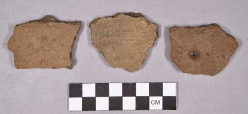 Ceramic, earthenware rim and body sherds, undecorated and impressed, grit-tempered; one perforated sherd