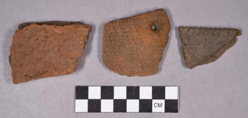 Ceramic, earthenware rim and body sherds, dentate, impressed, and incised; two perforated sherds