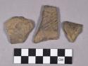 Ceramic, earthenware rim and body sherds, incised, dentate, and impressed