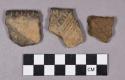 Ceramic, earthenware body and rim sherds, incised, includes grit-tempered
