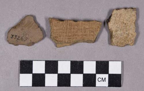 Ceramic, earthenware rim and body sherds, incised, incised-crosshatch, and cord-impressed