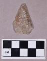 Chipped stone, projectile point, quartz; fragmented base