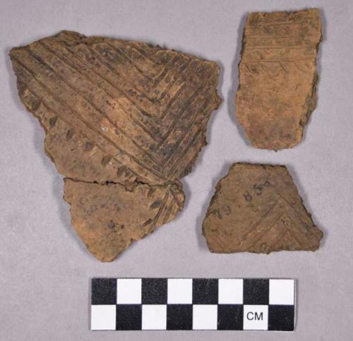 Ceramic, earthenware body and rim sherds, grit-tempered, linear-incised, dentate, and cord-impressed