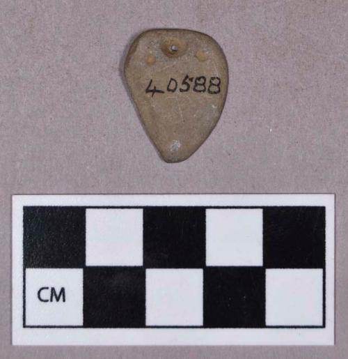 Ground stone, perforated stone, possible pendant