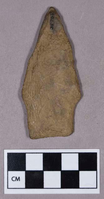 Chipped stone, projectile point, stemmed, incised design of canoe on water, and possible faded face on reverse