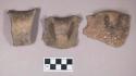 Ceramic, earthenware rim and handle sherds, undecorated, shell-tempered, one with lug, one with molded rim, shell-tempered