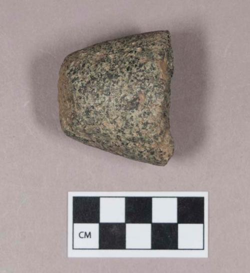 Ground stone, pecked and ground stone fragment, possible tool fragment