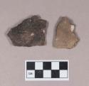 Ceramic, earthenware body sherds, one undecorated, one cord-impressed, shell-tempered