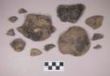 Ceramic, earthenware body and rim sherds, all sherds likely crossmend, shell-tempered, punctate and incised, with indented rim, with lugs with punctate decoration; some sherds crossmended with glue