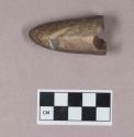 Ground stone, atlatl weight fragment, winged