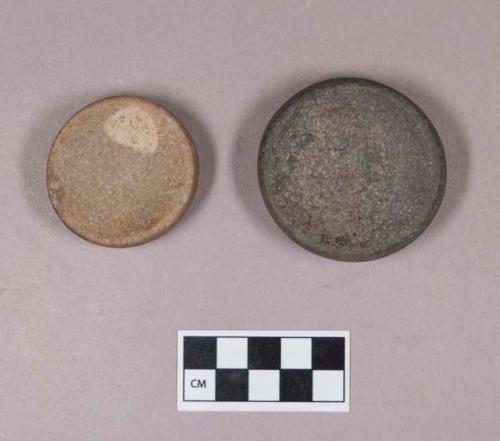 Ground stone, discoidal stones, concave on both sides