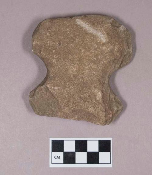 Ground stone, chipped and ground grooved axe