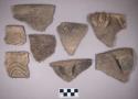 Ceramic, earthenware rim, body, and handle sherds, some incised, some with possible Ramie design, some cord-impressed, some punctate, some cord-impressed and incised, some undecorated, some with incised rim, some with molded handle, shell-tempered
