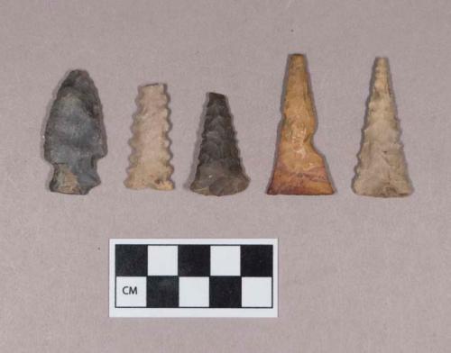 Chipped stone, projectile points, corner-notched and triangular, three serrated, one notched