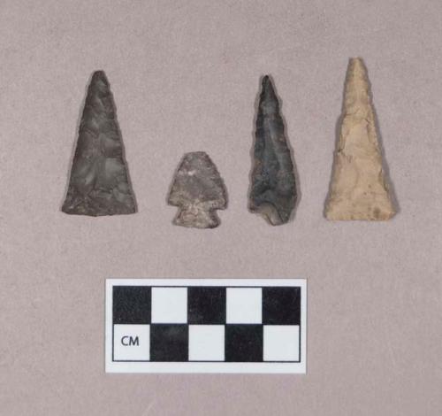 Chipped stone, projectile points, triangular and corner-notched; chipped stone, projectile point fragment