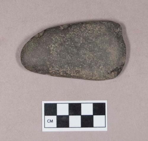 Ground stone, adze