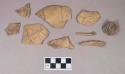 Turtle bone fragments; fish bone fragments, including jaw; antler tip fragment