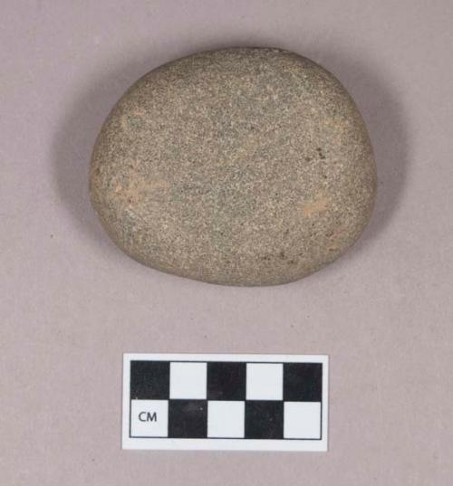 Ground stone, cobble with smoothed surfaces, possible rubbing stone