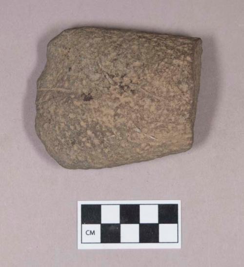 Ground stone, pecked and ground adze fragment, edge ground on one side