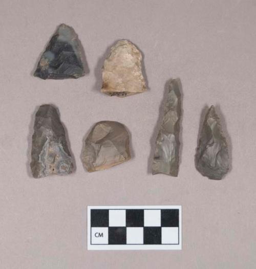 Chipped stone, drill fragment; chipped stone, biface fragments