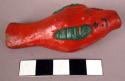 Pottery whistle -- form of a fish; painted in red and green