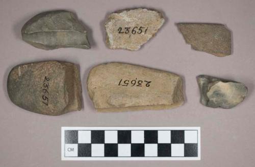 Ground stone, steatite body sherd, flat incised fragment, and atlatl weight fragments