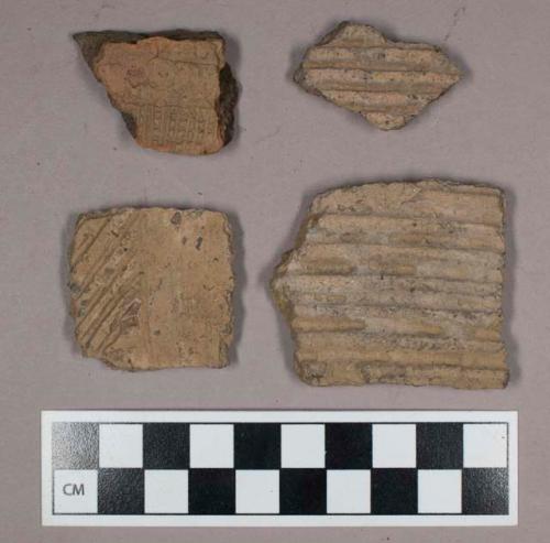 Ceramic, earthenware, body and rim sherds with impressed decoration, one sherd is mended