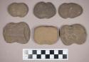 Ground stone, notched weights