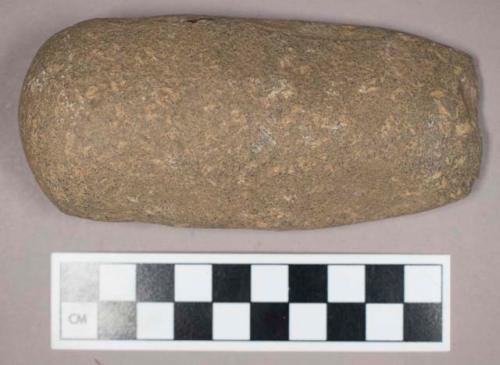 Ground stone, adze with rounded end