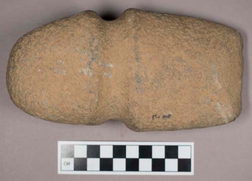 Ground stone, grooved axe with rounded end