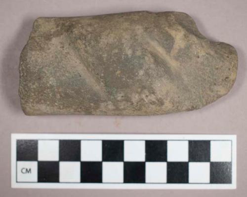 Ground stone, sharpening stone fragment