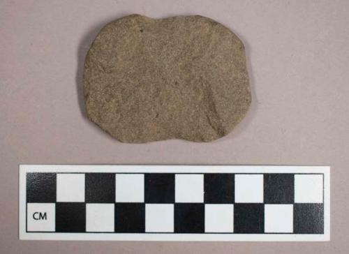 Ground stone, notched fragment