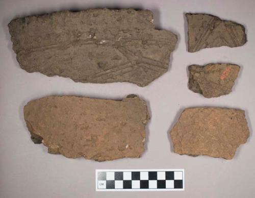 Ceramic, earthenware, body and rim sherds, some with impressed decoration