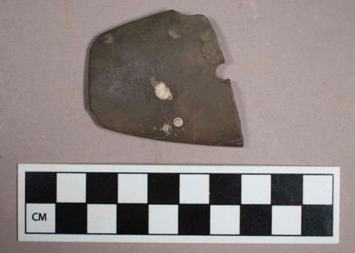 Ground stone, perforated gorget fragment